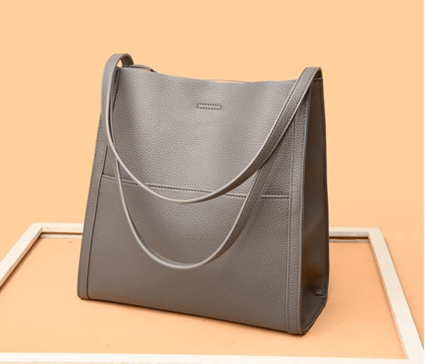 Skórzana torebka damska w kolorze zielonym – elegancki minimalistyczny design
