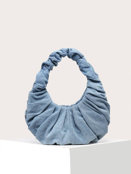 Jeansowa torebka na ramię w stylu vintage w kolorze niebieskim – widok z przodu