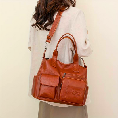 Niebieska torebka crossbody ze skóry premium – detal