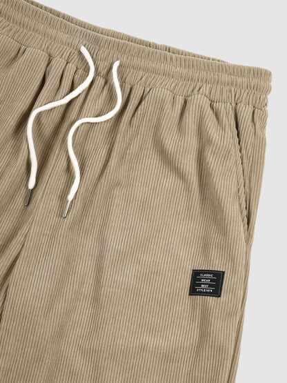 Sztruksowe spodnie casualowe męskie – widok z tyłu