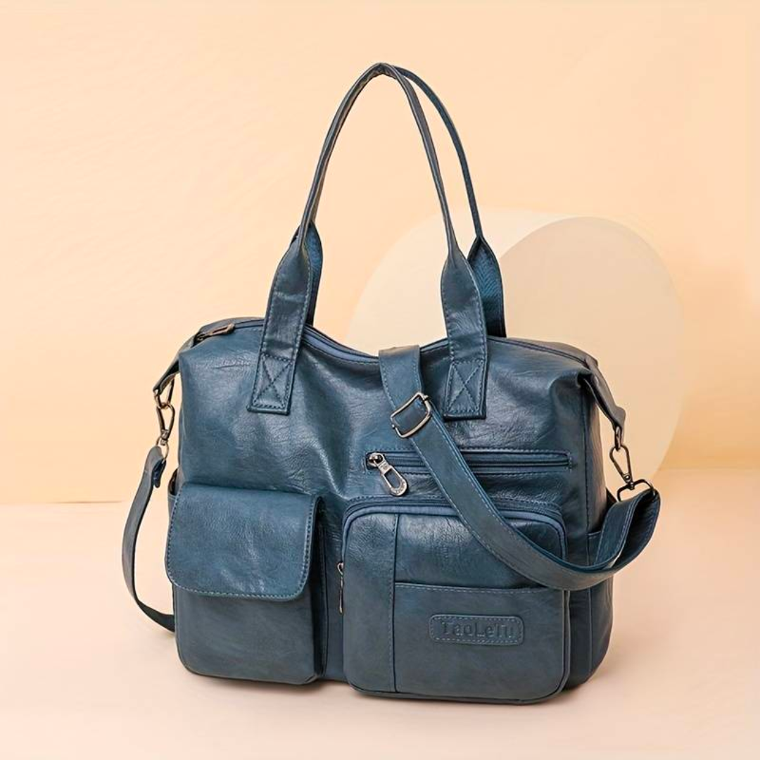 Skórzana torebka damska crossbody – zbliżenie na zapięcie