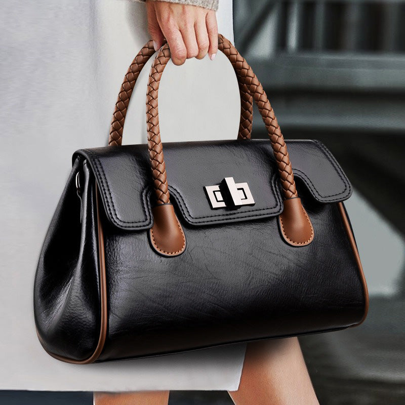 Elegancka torebka PU w kolorze czarnym – detal uchwytu