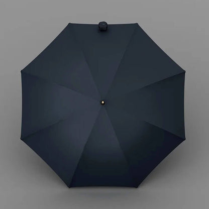 Długi elegancki parasol na tle miejskiego tła